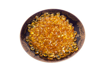 Dark plate with yellow amber stones