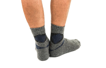 Legs from a businessman without his pants.