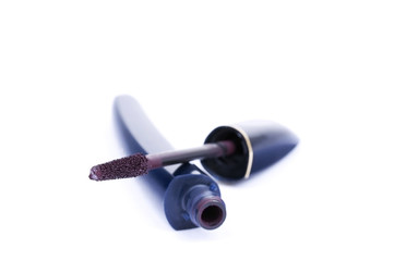 Mascara sticks closeup on white background