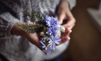 Hands girl with flowers