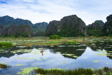 Fototapeta na wymiar Van Long, Ninh Binh - Famous eco tourim in Vietnam.