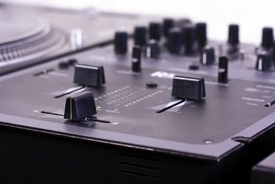 DJ mixer closeup shot

