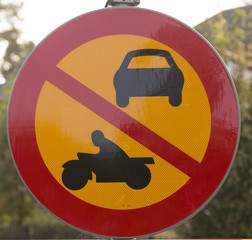 A sign showing that it's forbidden for all vehicles with engines