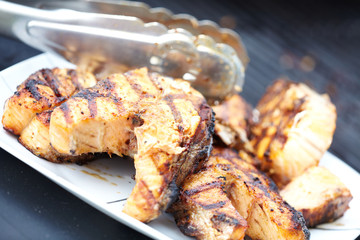 Salmon fish roast on barbecue grill.