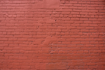 Hintergrund rote Backsteinwand mit Fehlstellen