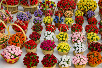 Flowers arranged in baskets