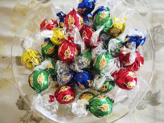 Wrapped candy in a glass bowl