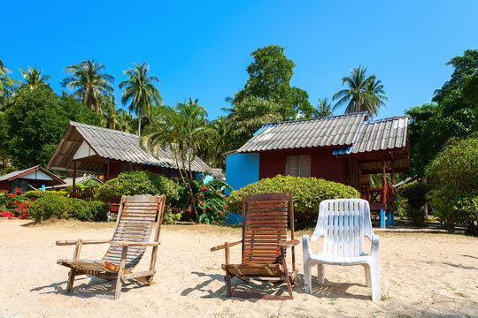 bungalow, chaise lounge on a beach