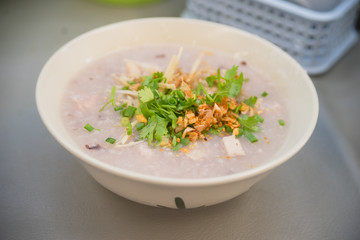 Soft boiled rice with pork and vegetable in breakfast time