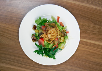 Salad with fried onions, potatoes