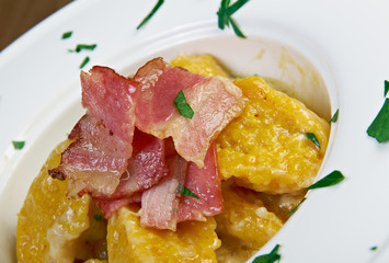 potato gnocchi with cheese and bacon.