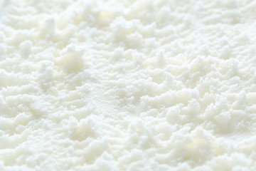 Sweet white ice cream background, close up