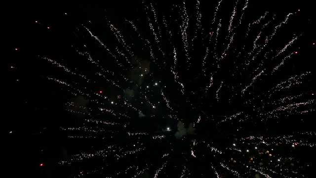 new year fireworks flashing in the night sky