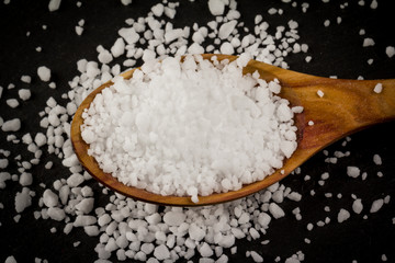 Sea Salt In Wooden Spoon