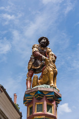Fototapeta na wymiar Statue of the Samson Fountain in Bern, Switzerland