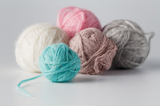 Clews of colored yarn