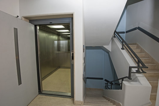 Building interior with lift and staircase