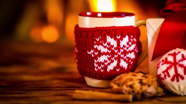 Christmas decorations against fireplace. Xmas holiday concept