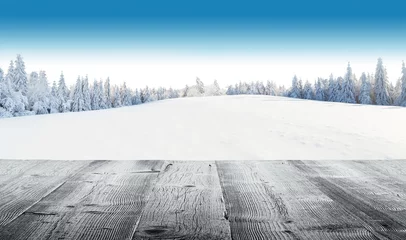 Photo sur Plexiglas Hiver Winter snowy landscape with wooden planks