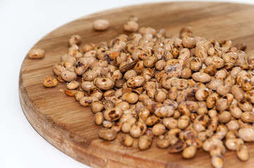 Soy beans on the wooden board
