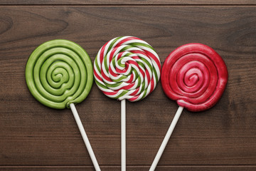 three colorful lollipops
