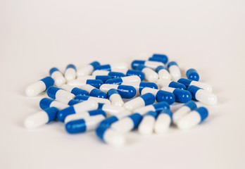 Blue and white capsules