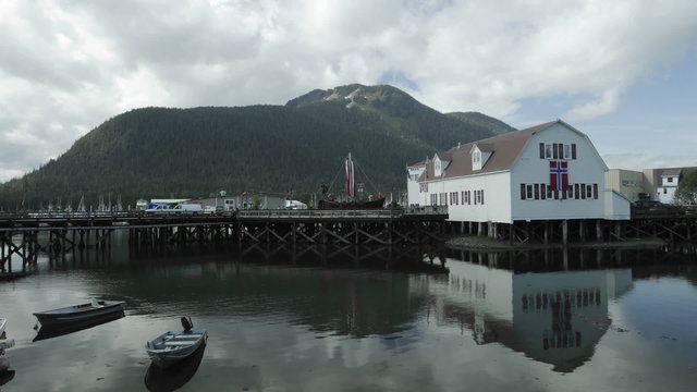 Time lapse of the clouds passing over Sons of Norway Hall and boats moving in Hammer Slough in Petersburg, Alaska.
