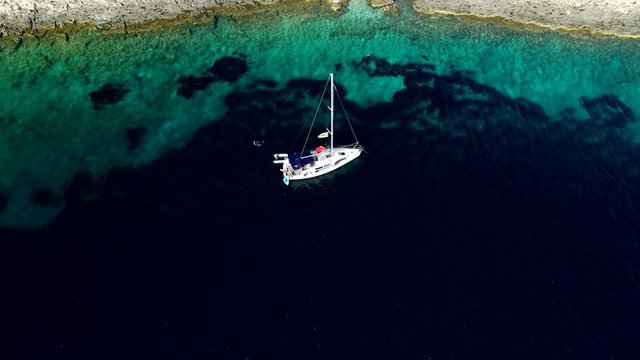 Idyllic island with transparent water croatia, korcula island yacht on a transparent fashion Adriatic Sea