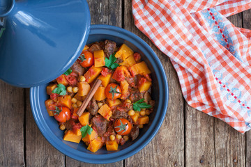Moroccan Tagine with beef, chickpeas,  pumpkin and cherry tomato