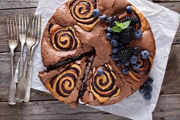 Chocolate cake with rolls inside