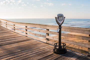 Sightseeing Binoculars with on the Virginia Beach Fishing Pier with Beach Background