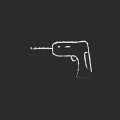 Hammer drill icon drawn in chalk.