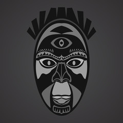 Gray African Mask on a black background
