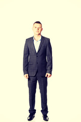 Confident businessman looking at camera