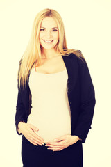 Pregnant woman in business suit.