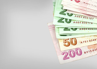 Turkish banknotes. Turkish Lira ( TL ) on grey background.