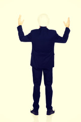 Smiling businessman with open arms up