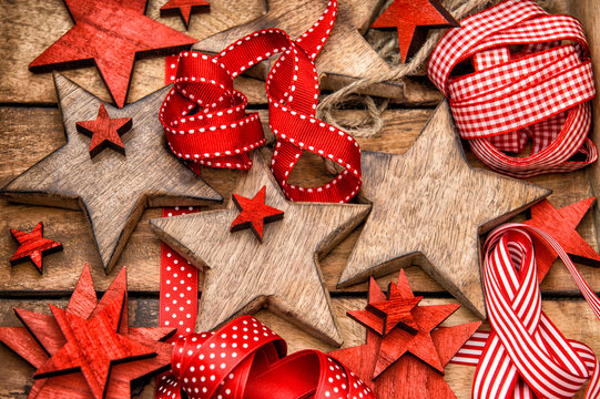 Christmas decorations wooden stars and red ribbons