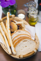 bread in basket appetizer before dinner