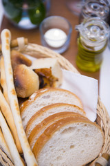bread in basket appetizer before dinner