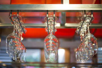 wine glass hanging on the counter in wine bar