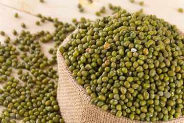 green beans on wood background