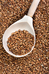 wooden spoon with buckwheat