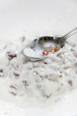 Stuffing for rolling pancakes cream and fried bacon