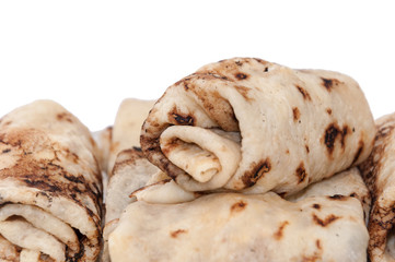 Stuffed rolled pancakes with sour cream fried bacon