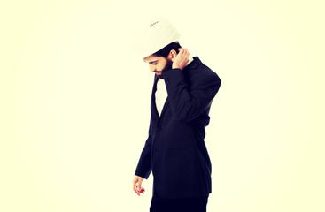 Businessman with shoulder pain.