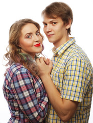  lovely happy couple hugging over white background.