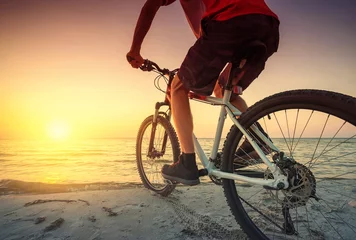 Wall murals Bicycles Ride on bike on the beach. Sport and active life concept