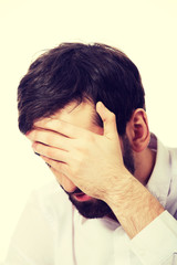 Fototapeta premium Young depressed businessman.