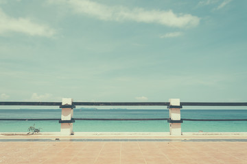 balcony with blue sky and sea - soft focus with film filter